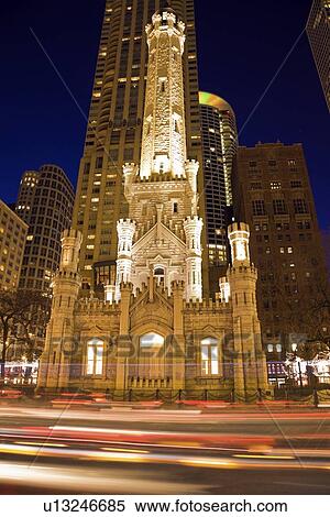 Stock Photography - USA, Illinois, Chicago Water Tower illuminated at night. Fotosearch