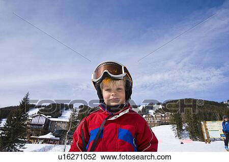 Stock Image - USA, Montana, Whitefish, Boy (4-5) skiing. Fotosearch