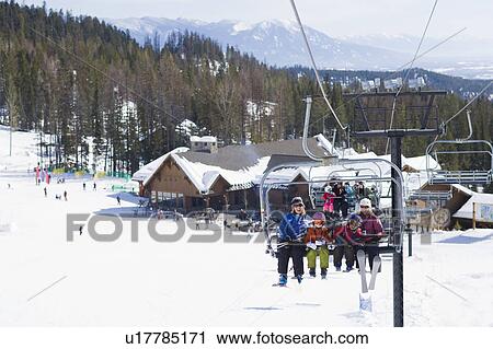 USA, Montana, Whitefish, Family on ski lift View Large Photo Image Stock Image - USA, Montana, Whitefish, Family on ski lift. Fotosearch