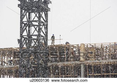 USA, New York City, construction site in snowstorm View Large Photo Image Stock Photograph - USA, New York City, construction site in snowstorm. Fotosearch