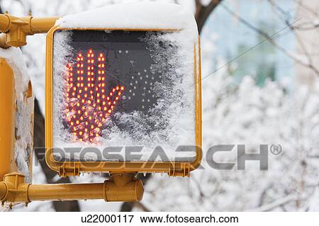 USA, New York City, New York, don't walk sign with hand covered with snow View Large Photo Image Stock Photo - USA, New York City, New York, don't walk sign with hand covered with snow. Fotosearch