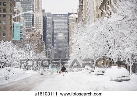 Stock Image - USA, New York City, Park Avenue in winter. Fotosearch