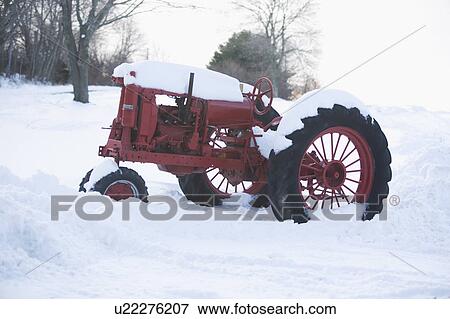 USA, New York, Cutchoge, old tractor covered in snow View Large Photo Image Stock Photo - USA, New York, Cutchoge, old tractor covered in snow. Fotosearch