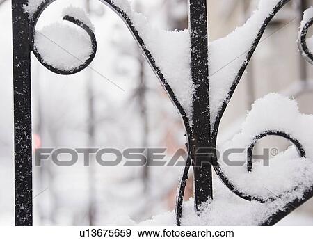 Stock Photo - USA, New York State, Brooklyn, Williamsburg, railing covered with snow. Fotosearch