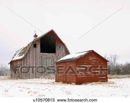 Stock Image - USA, New York State, Farm buildings in snow. Fotosearch