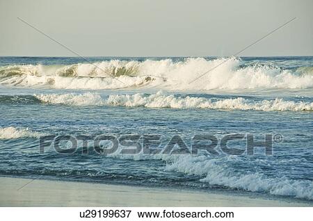Stock Photo - USA, North Carolina, Outer Banks, Kill Devil Hills, sea waves. Fotosearch
