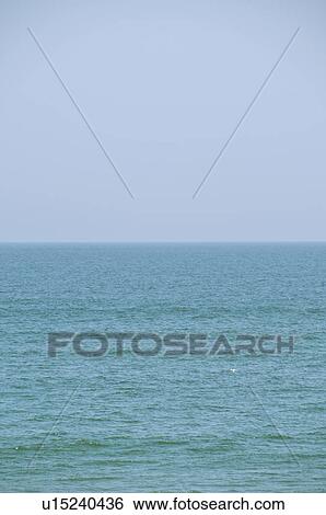 Stock Photograph - USA, North Carolina, Outer Banks, Kill Devil Hills, seascape. Fotosearch
