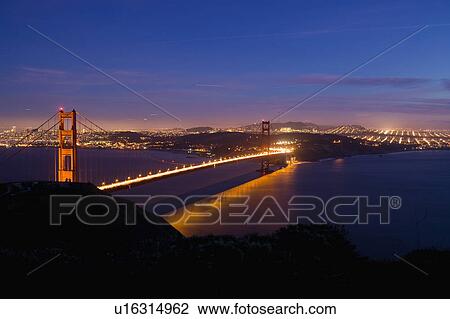 Stock Image - USA, San Francisco, City skyline with Golden Gate Bridge. Fotosearch