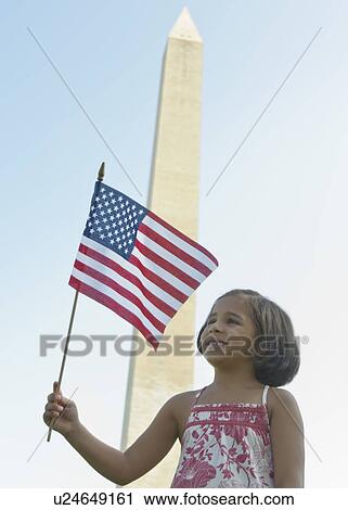 USA, Washington DC, girl (6-7) with US flag in front of Washington Monument View Large Photo Image Stock Image - USA, Washington DC, girl (6-7) with US flag in front of Washington Monument. Fotosearch