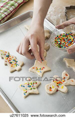 Woman preparing biscuits with pastry cutter View Large Photo Image Stock Photography - Woman preparing biscuits with pastry cutter. Fotosearch
