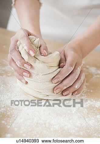 Woman preparing dough View Large Photo Image Stock Image - Woman preparing dough . Fotosearch