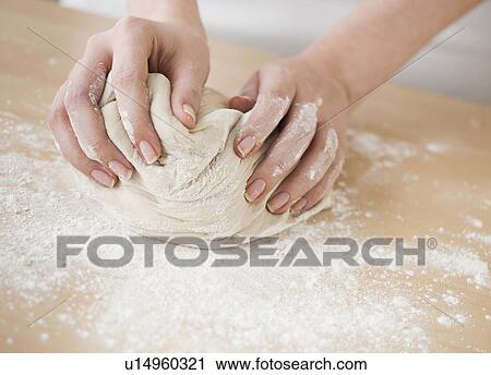 Woman preparing dough View Large Photo Image Stock Image - Woman preparing dough . Fotosearch
