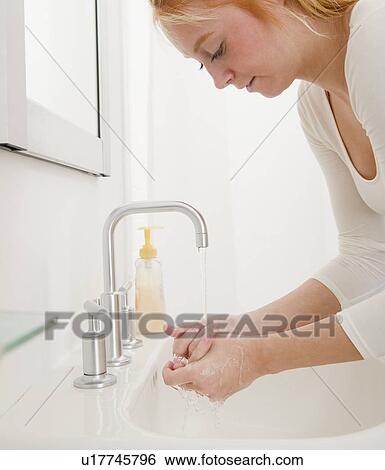 Woman washing hands View Large Photo Image Stock Photograph - Woman washing hands. Fotosearch