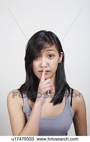 Young woman daydreaming View Large Photo Image Stock Image - Young woman daydreaming. Fotosearch