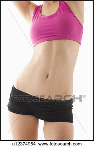 Picture - Young woman's with slim belly. Fotosearch