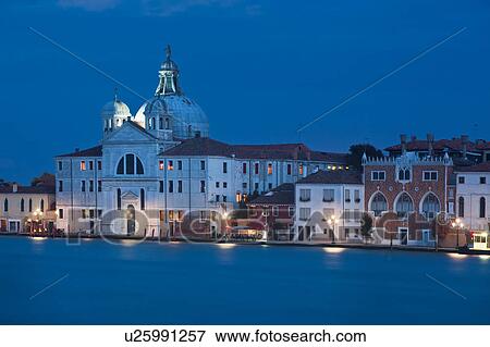 View of church of Sant'Eufemia, at twilight, with motion blur of water of Canale della Giudecca, lights illuminated along quayside, autumn in Venice, Northern Italy View Large Photo Image Stock Photo - View of church of Sant'Eufemia, at twilight, with motion blur of water of Canale della Giudecca, lights illuminated along quayside, autumn in Venice, Northern Italy. Fotosearch