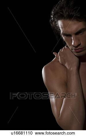 Stock Image - Aching shoulder. Fotosearch