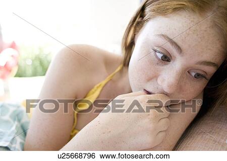 Stock Photograph - Anxious teenage girl. Fotosearch