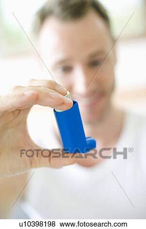 Stock Photo - Asthma inhaler use. Fotosearch