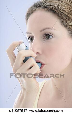 Stock Photo - Asthma inhaler use. Fotosearch