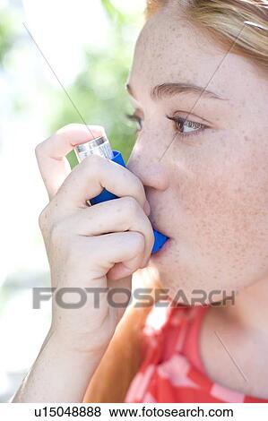 Stock Photo - Asthma inhaler use. Fotosearch