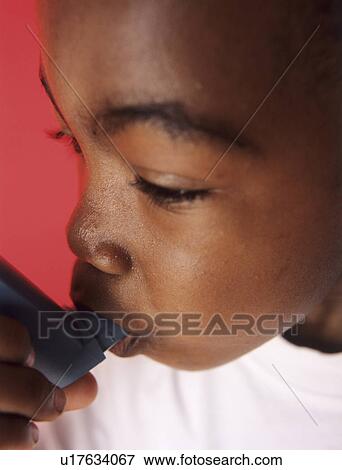 Stock Photo - Asthmatic boy. Fotosearch