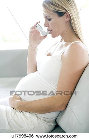 Stock Photograph - Asthmatic pregnant woman. Fotosearch