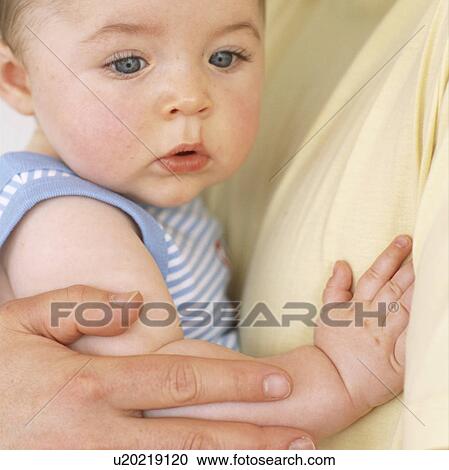 Stock Image - Baby boy and father. Fotosearch
