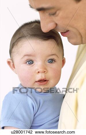 Stock Image - Baby boy and father. Fotosearch