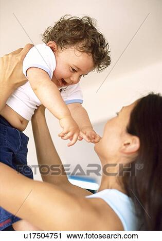 Baby boy and mother View Large Photo Image Stock Image - Baby boy and mother. Fotosearch