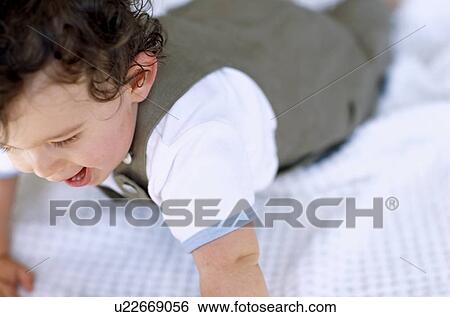 Stock Photograph - Baby boy. Fotosearch