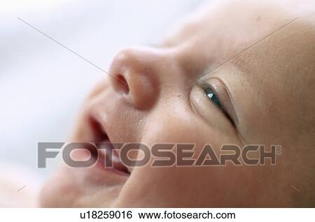 Stock Photograph - Baby boy's face. Fotosearch
