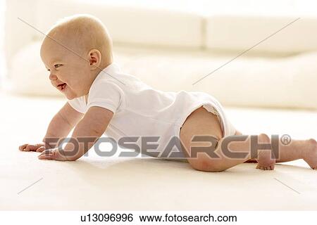 Baby crawling View Large Photo Image Stock Photograph - Baby crawling. Fotosearch