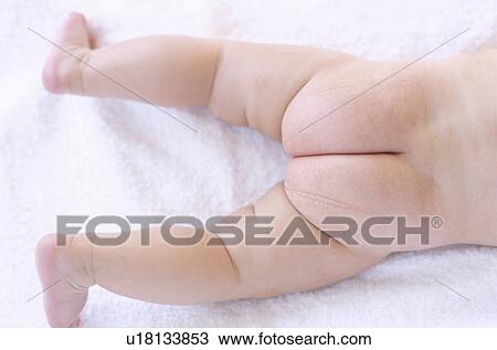 Stock Image - Baby's bottom and legs. Fotosearch