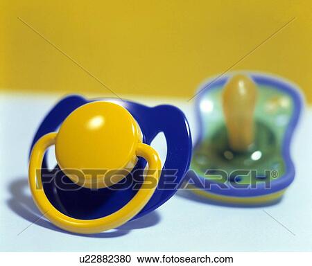 Stock Image - Baby's dummies. Fotosearch