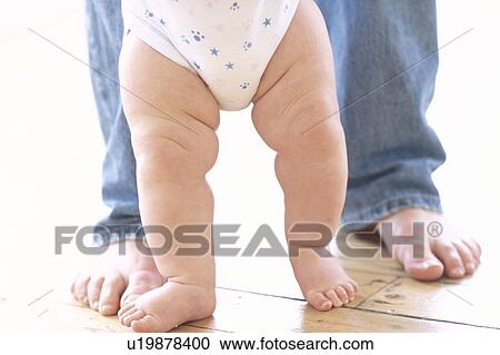 Stock Image - Baby's legs. Fotosearch