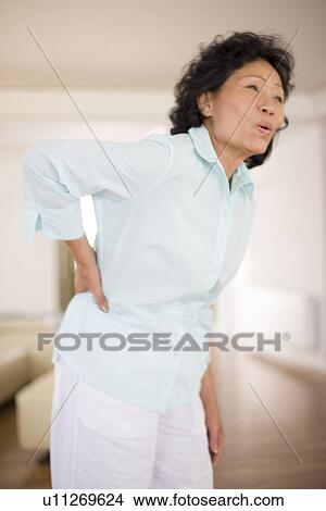 Picture - Back pain. Fotosearch