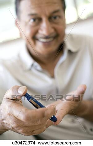 Blood glucose test View Large Photo Image Picture - Blood glucose test. Fotosearch
