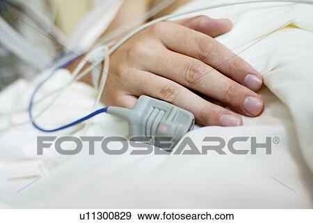 Stock Photo - Blood oxygen monitor. Fotosearch