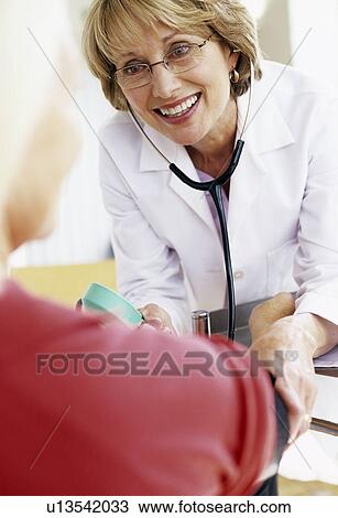 Blood pressure measurement View Large Photo Image Stock Image - Blood pressure measurement. Fotosearch