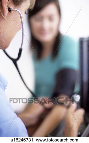 Blood pressure measurement View Large Photo Image Stock Image - Blood pressure measurement. Fotosearch