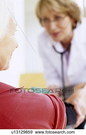 Blood pressure measurement View Large Photo Image Stock Photo - Blood pressure measurement. Fotosearch