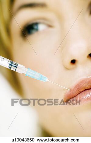Stock Image - BOTOX® treatment, conceptual image. Fotosearch