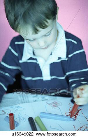Boy drawing View Large Photo Image Stock Image - Boy drawing. Fotosearch