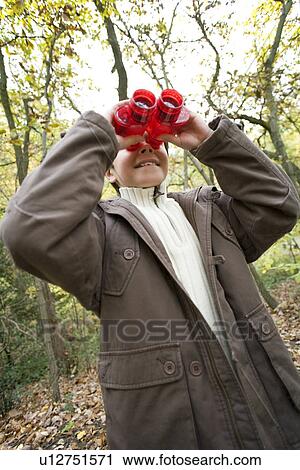 Boy using binoculars View Large Photo Image Stock Image - Boy using binoculars. Fotosearch