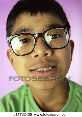 Stock Photography - Boy wearing glasses. Fotosearch