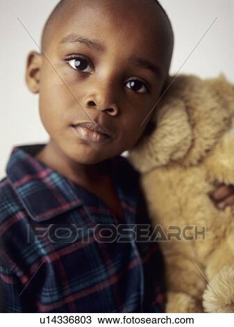 Boy with teddy bear View Large Photo Image Stock Image - Boy with teddy bear. Fotosearch