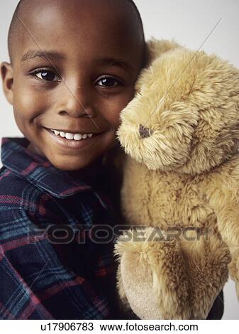 Boy with teddy bear View Large Photo Image Stock Image - Boy with teddy bear. Fotosearch