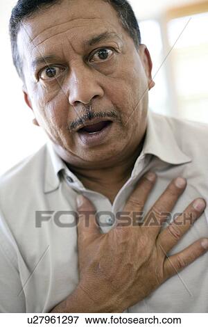 Chest pain View Large Photo Image Stock Photo - Chest pain. Fotosearch