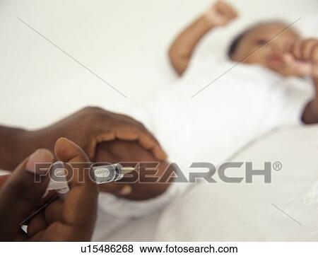 Childhood injection View Large Photo Image Stock Photo - Childhood injection. Fotosearch
